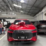 chery tiggo cross premium merah